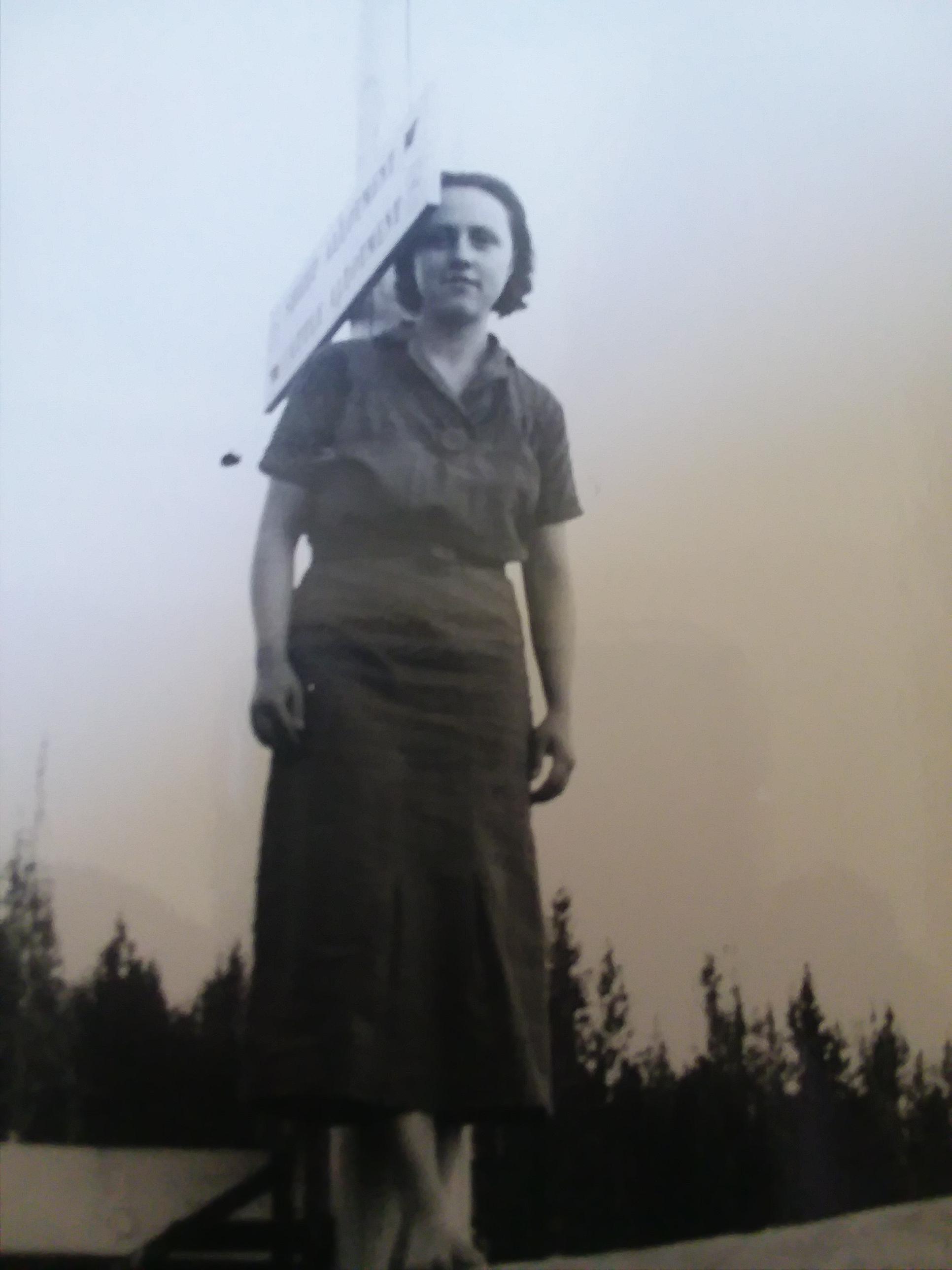 A younger photograph of Edith Lettie Cleveland standing outdoors